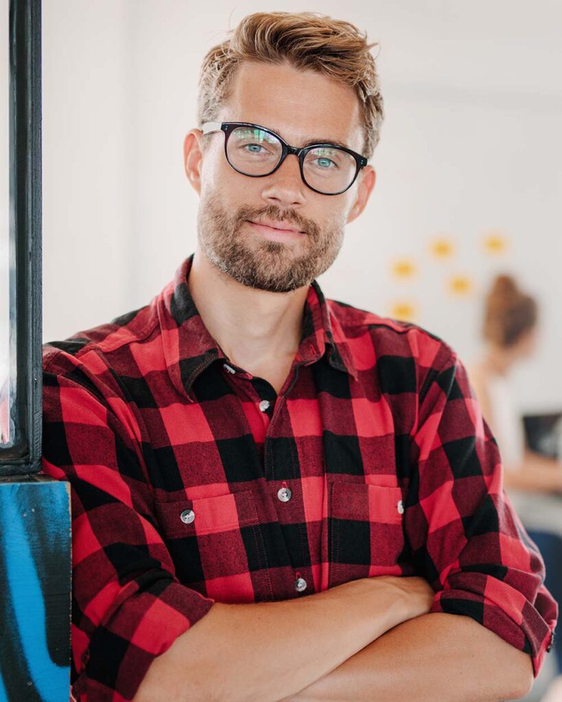 young man with glasses and a beard